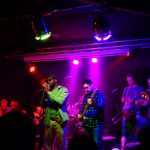 Makongo pictured on stage at The Glad Cafe