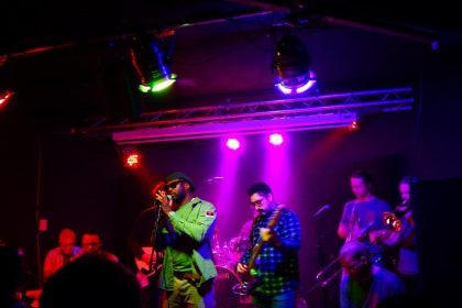 Makongo pictured on stage at The Glad Cafe